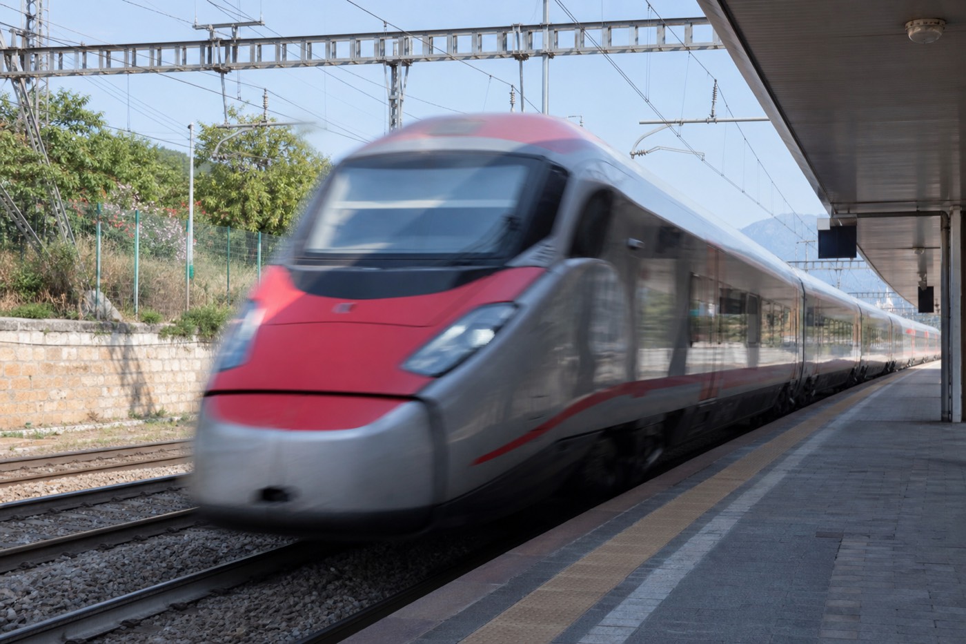 A Trenitalia train pulling into a platform, the usual way of getting to Parma by train from Milan, Bologna, Florence or Venice